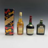 A bottle of Remy Martin Fine Champagne Cognac (boxed), together with a bottle of Courvoisier and two