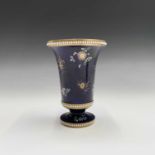 A Spode blue ground trumpet vase, circa 1820, painted pattern number 3420, with scattered floral