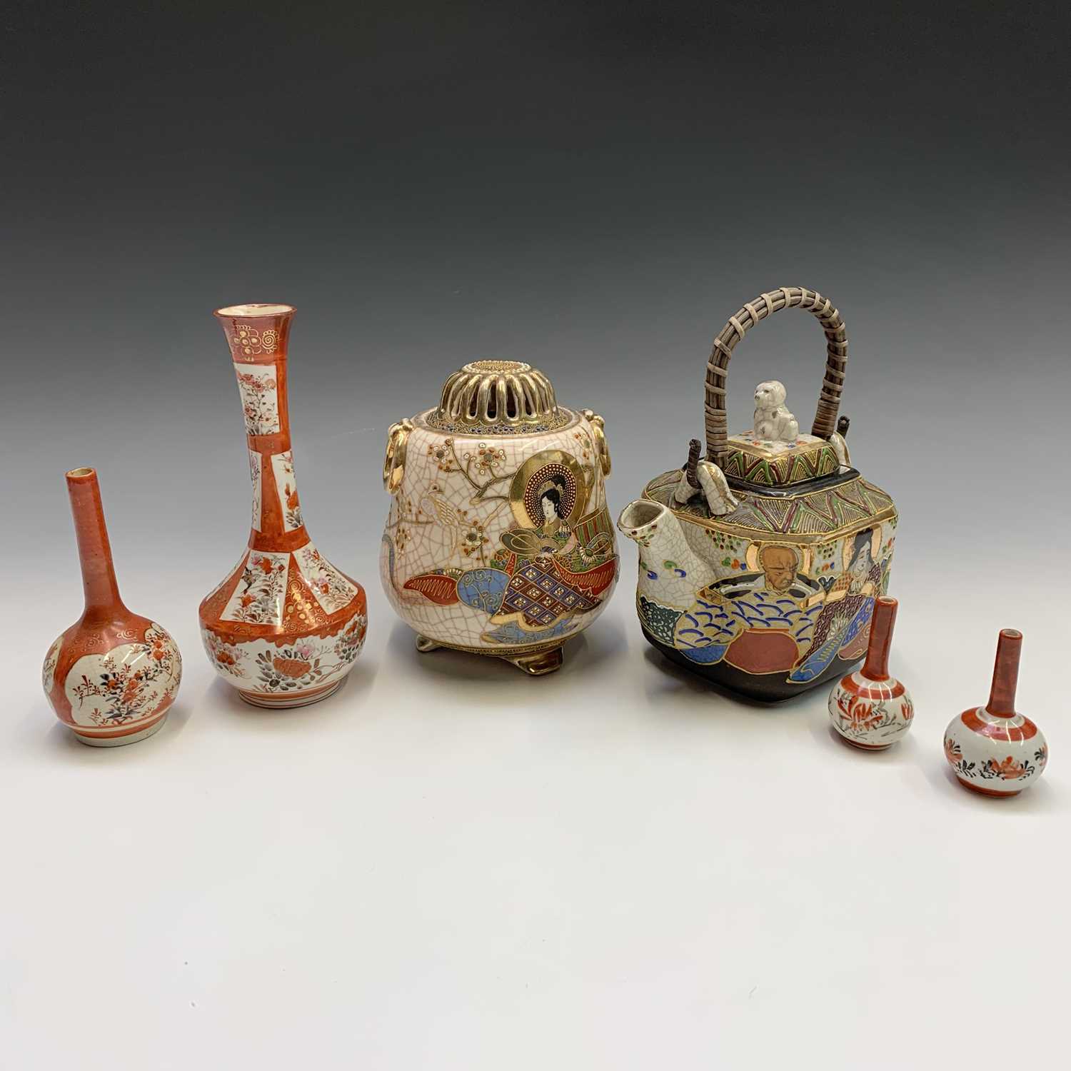 Four assorted Japanese Kutani vases, the largest 22cm, together with a Japanese teapot and a jar and