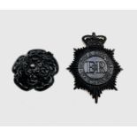 Two Devon and Cornwall Constabulary helmet badges. 11cm x 8cm and 7cm diameter.