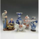 A Chinese crackleglaze blue and white vase, 20th century, painted figures in a garden, height