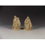 A Nottingham alabaster style figure group depicting a woman with two children, together with a