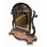 A Victorian mahogany dressing table mirror, with an arched mirrored plate,height 76cm, width 76cm,