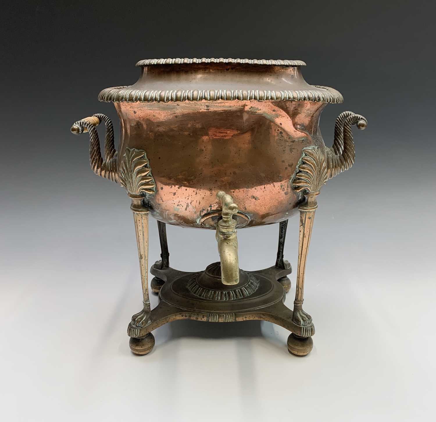 A George III twin handled copper and brass tea urn, the body raised on reeded columns terminating in - Image 5 of 5