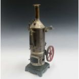 A Gebruder Bing live steam model vertical steam engine, height 35cm.