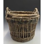 Two Newlyn wicker fish baskets, one with corks for a long line, height 50cm, along with three wooden