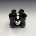A pair of German WWII binoculars, with engraved eagle motif (partially erased), also engraved N
