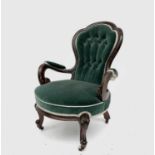 A Victorian stained walnut gentlemans armchair, height 92cm, width 66cm.
