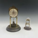 A German 400 day torsion clock, the shaped dial with etched secessionist style decoration and Arabic