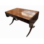 A mahogany and satinwood crossbanded sofa table, early 19th century, each frieze with a single