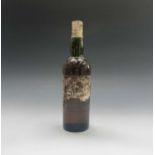 A bottle of vintage whisky, indistinctly labelled 'Glengarry? Finest Old Scotch Whisky'.