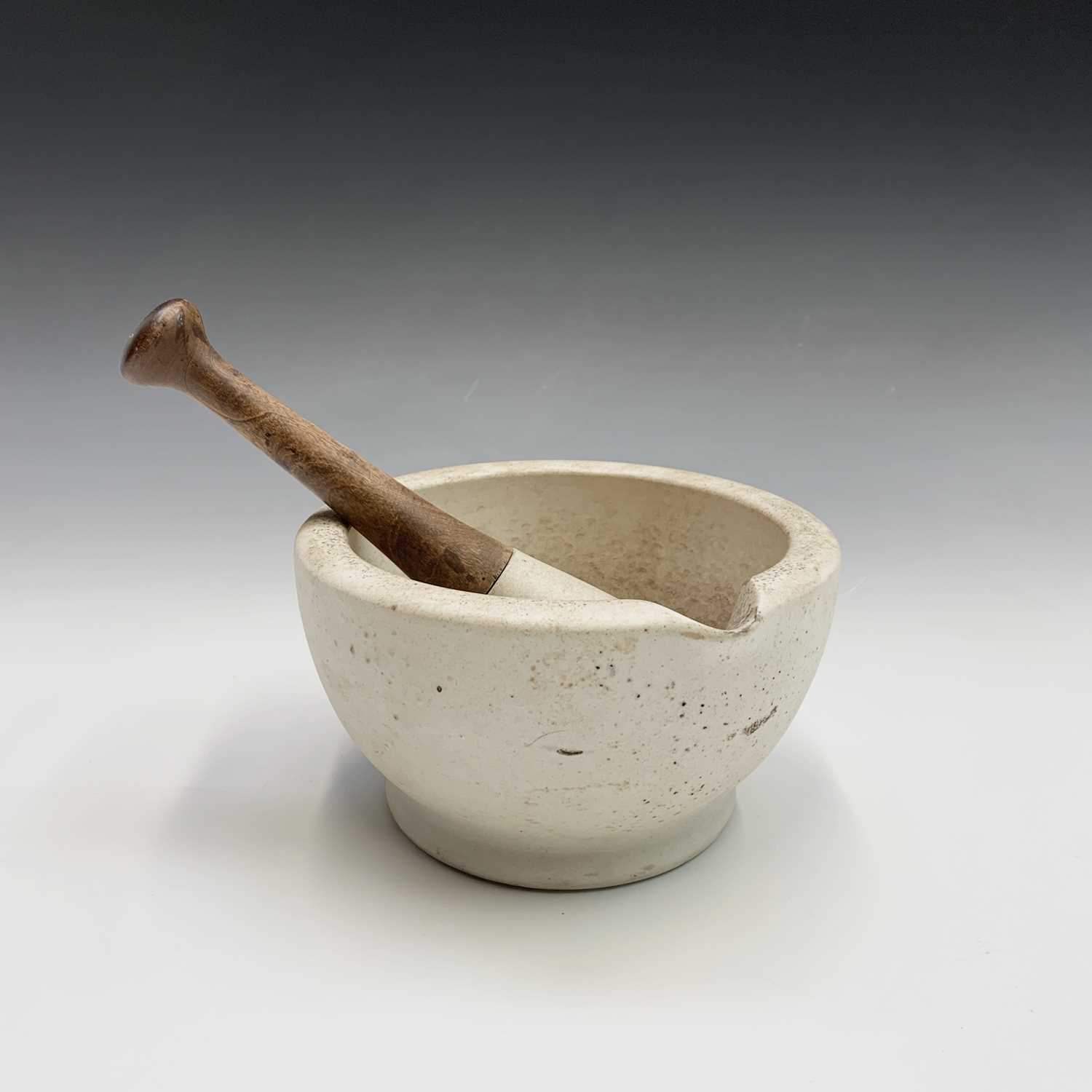 A pestle and mortar. Height of mortar 11cm, length of pestle 22.5cm. - Image 4 of 6