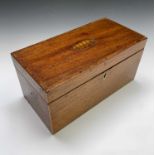 A George III period satinwood tea caddy of Sheraton design, having inlaid shell motif to the lid and