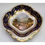 A Bloor Derby topographical dish, 'Launceston Cornwall', the vignette within blue and gilt border,
