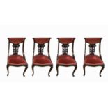 A set of four Art Nouveau mahogany salon chairs.