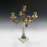 A gilt metal candelabra, 20th century, with white marble turned column and base, height 41cm.
