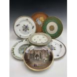 A Derby porcelain plate, early 19th century, painted with speedwell together with six assorted