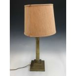 A brass Corinthian column table lamp. Height of base 36.5cm.