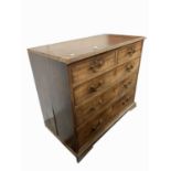 A George III mahogany chest of drawers, of small proportions, with two short and three long drawers,