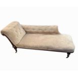 A Victorian mahogany upholstered chaise lounge, with turned tapering legs, height 65cm, width