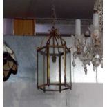 A Georgian design brass finish hall lantern of hexagonal form. Height 40cm.