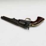 A Colt Model 1849 five shot hammer action percussion revolver with brass trigger guard, the cylinder