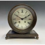 A bronze ship's shelf clock by the Chelsea Clock Co, USA, retailed by Goldsmiths and Silversmiths