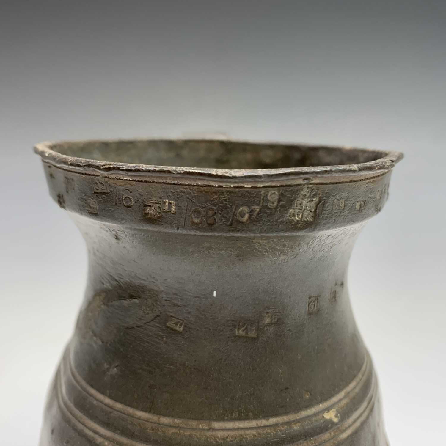 A 19th century pewter flagon with hinged cover, engraved with tulips and initialled G.A.K. and dated - Image 11 of 20