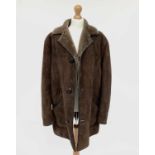 A vintage Nurseys brown sheepskin coat, label size 44.