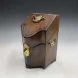 An 18th century mahogany small knife box with serpentine front and sloping line inlaid lid, with