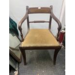 A Regency mahogany open armchair, with a horizontal turned and fluted bar splat, height 86cm,