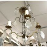 A Venetian style four branch chandelier, with two tiers of pear shape drops above similarly