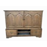 A George III oak mule chest, with alterations, height 108cm, width 43cm.