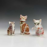 Three Royal Crown Derby cat paperweights - 'Jock VI of Chartwell', 'Flora Kitten' and one other.