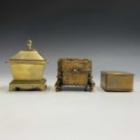 A 19th century brass tobacco jar and cover, of sarcophagus form, width 11cm, together with a late