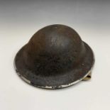 A Second World War policeman's helmet.