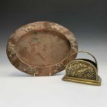 An Art Nouveau oval copper tray, with repousse decoration, width 34cm, together with a brass