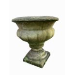 A pair of reconstituted stone pedestal garden urns. Height 42cm.