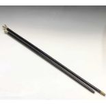 A Victorian ebony walking cane, with silver top, length 91cm, together with another similar cane (