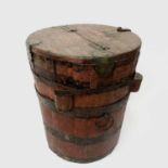 An Oriental hardwood, brass and iron bound cask, with side ring carrying handles, height 51cm. The