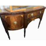 A inlaid mahogany sideboard, early 19th century, with brass gallery, height 124cm, width 181cm,