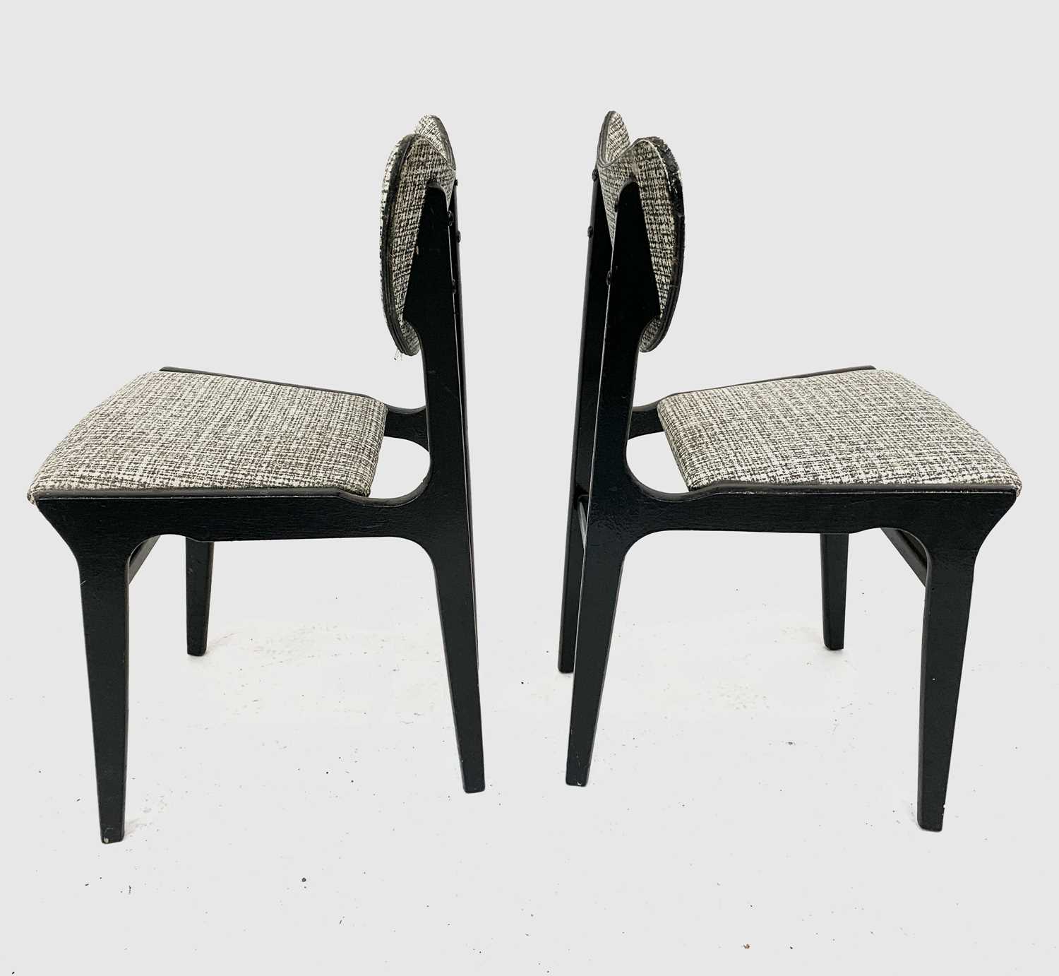 A pair of 1950's black painted butterfly back chairs. - Image 2 of 3