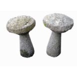 A near pair of 19th century granite staddle stones of typical form with circular tops on tapered