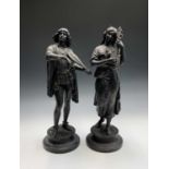 A pair of late 19th century French spelter figures of Renaissance musicians, on circular socle