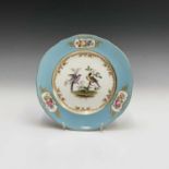 A Davenport dessert plate, circa 1840 painted in the Sevres style with two exotic birds within