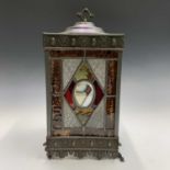 A late Victorian leaded glass hall lantern, the brass surround with anthemion, foliate and