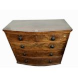 A Victorian mahogany bow front chest of drawers, with two short and three long drawers, on bun feet,