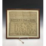 A 19th century sampler worked by Mary Ann Rebekah Holmer, embroidered with the alphabet and verse,