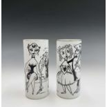 A pair of milk glass vases or beakers, with printed cartoon images after Benier, titled 'The Black