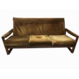 GUY ROGERS, a 1960's Virginia three-piece teak lounge suite, upholstered in green buttoned
